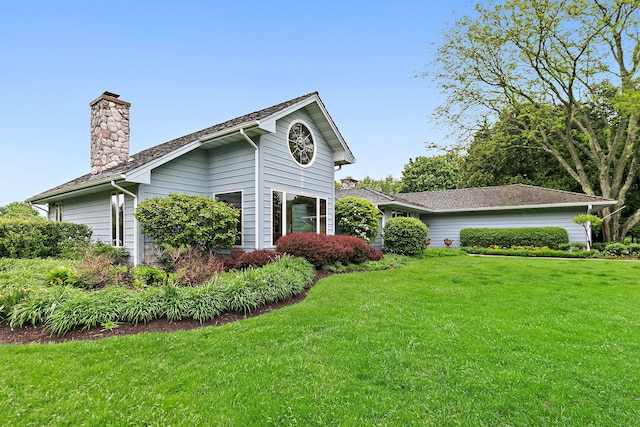 660 Plum Tree Dr, Barrington Hills, IL 60010 - view of home's exterior with a chimney and a yard