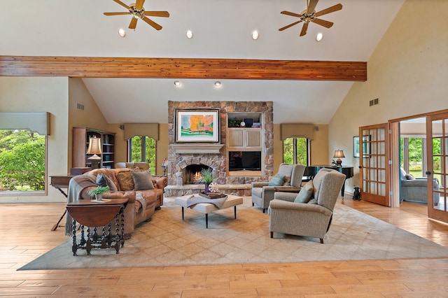 660 Plum Tree Dr, Barrington Hills, IL 60010 - living area featuring ceiling fan, high vaulted ceiling, light wood-style flooring, beam ceiling, and healthy amount of natural light