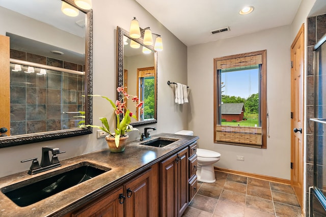 660 Plum Tree Dr, Barrington Hills, IL 60010 - bathroom featuring healthy amount of natural light, a shower stall, toilet, double vanity, and recessed lighting