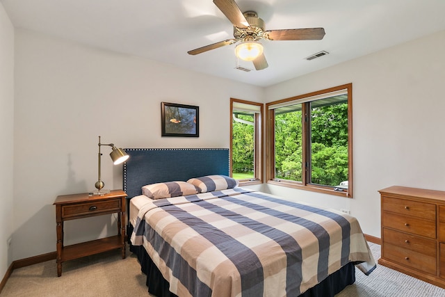 660 Plum Tree Dr, Barrington Hills, IL 60010 - bedroom with light carpet, baseboards, and ceiling fan