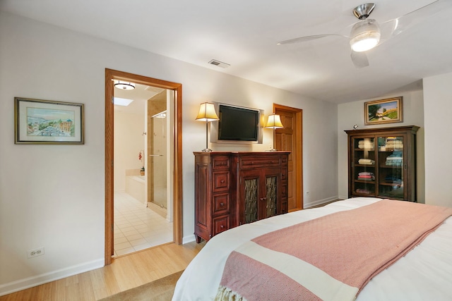 660 Plum Tree Dr, Barrington Hills, IL 60010 - bedroom with light wood-type flooring, baseboards, a ceiling fan, and ensuite bath