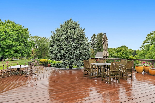 660 Plum Tree Dr, Barrington Hills, IL 60010 - wooden terrace with outdoor dining area and view of scattered trees
