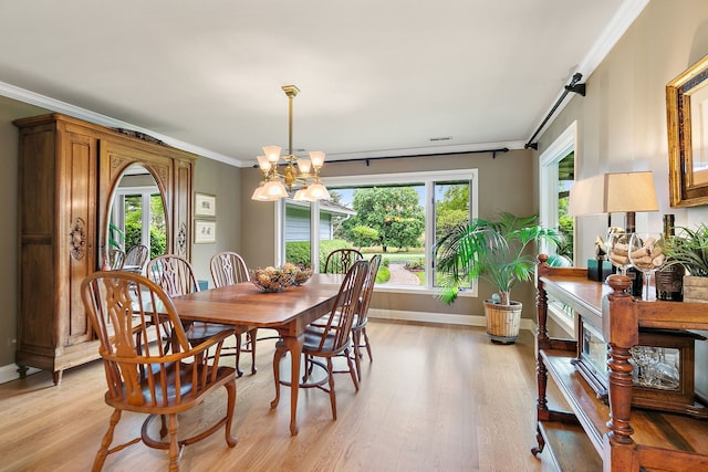 660 Plum Tree Dr, Barrington Hills, IL 60010 - dining room featuring a chandelier, plenty of natural light, light wood finished floors, and crown molding