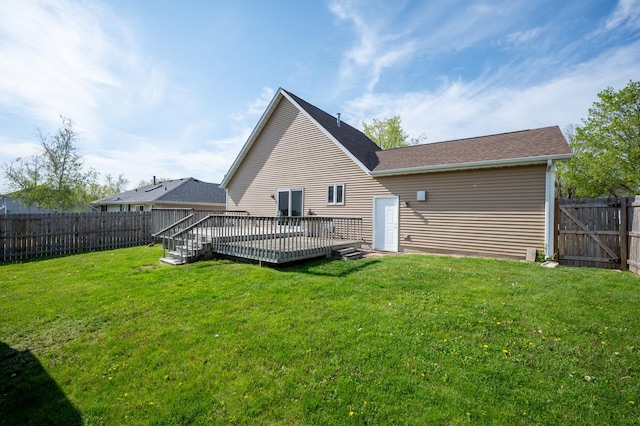 rear view of property with a deck