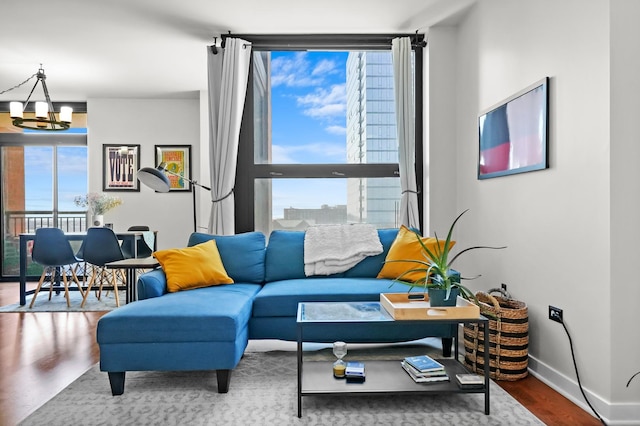 1160 S Michigan Ave Unit 1005, Chicago, IL 60605 - living room with wood finished floors, a chandelier, and baseboards