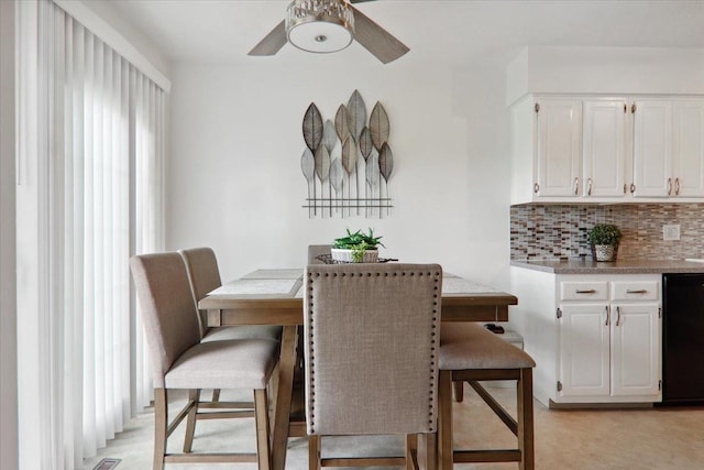 dining area featuring a ceiling fan