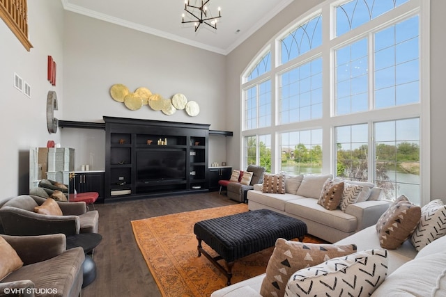 22844 Lakeview Estates Blvd, Frankfort, IL 60423 - living room featuring a chandelier, dark wood finished floors, a high ceiling, and ornamental molding