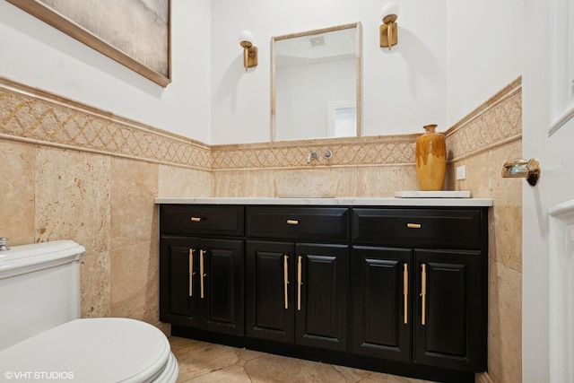 22844 Lakeview Estates Blvd, Frankfort, IL 60423 - half bath with tile walls, toilet, vanity, and wainscoting