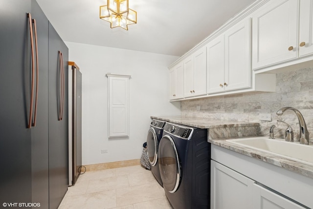 22844 Lakeview Estates Blvd, Frankfort, IL 60423 - laundry room with separate washer and dryer, cabinet space, baseboards, and light tile patterned floors