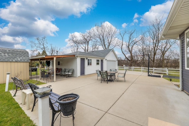 31 Bruce Ct N, Lockport, IL 60441 - view of patio with outdoor dining area, fence, an outbuilding, and a shed
