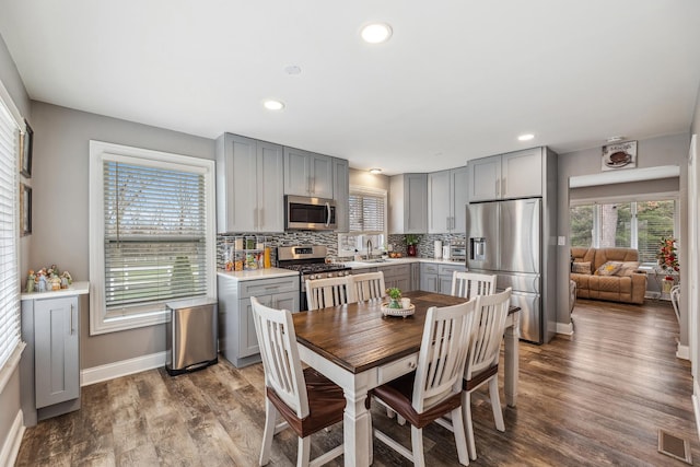 31 Bruce Ct N, Lockport, IL 60441 - dining room with baseboards, dark wood-style floors, and recessed lighting