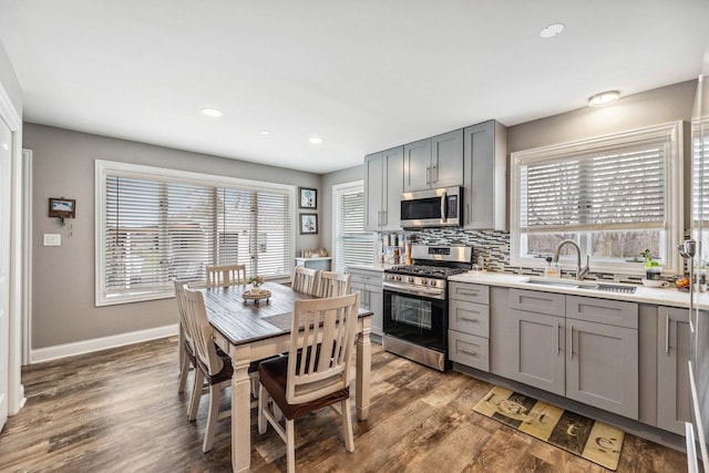 31 Bruce Ct N, Lockport, IL 60441 - kitchen with stainless steel appliances, a sink, gray cabinets, healthy amount of natural light, and recessed lighting