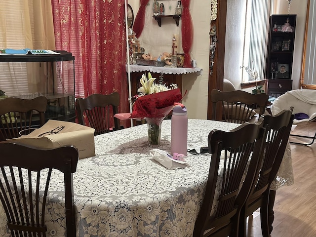dining room with wood finished floors