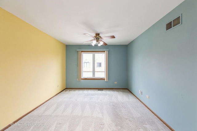 17581 Windsor Pkwy Unit 1, Tinley Park, IL 60477 - spare room featuring a ceiling fan, light colored carpet, and baseboards