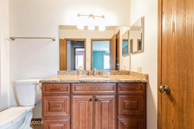 17581 Windsor Pkwy Unit 1, Tinley Park, IL 60477 - bathroom featuring toilet and vanity