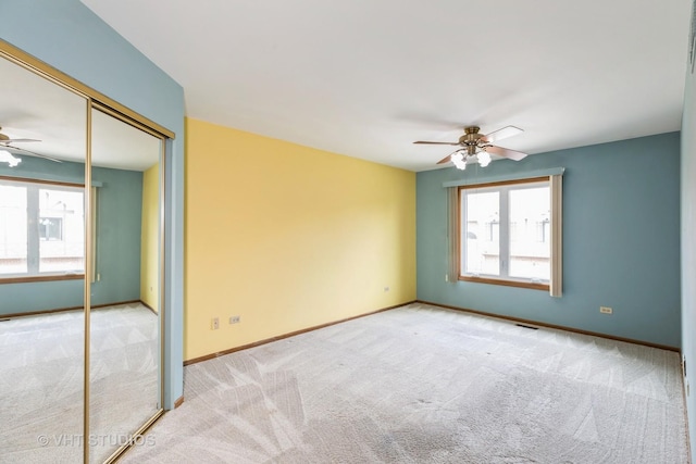 17581 Windsor Pkwy Unit 1, Tinley Park, IL 60477 - carpeted empty room with ceiling fan and baseboards
