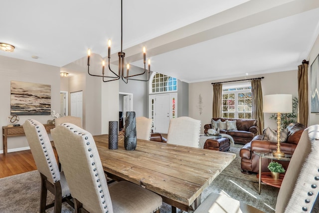 dining room featuring a chandelier and wood finished floors
