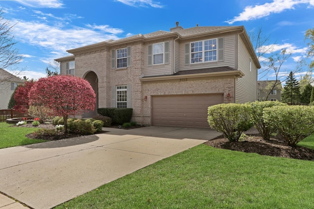 traditional-style home with an attached garage, concrete driveway, brick siding, and a front lawn