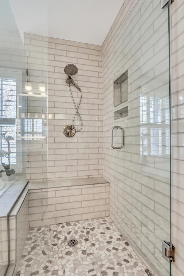 full bath featuring a stall shower
