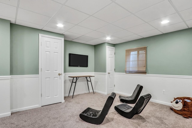 workout area featuring carpet, recessed lighting, and a paneled ceiling
