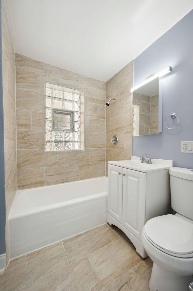 1235 N Mason Ave, Chicago, IL 60651 - bathroom with shower / bathtub combination, toilet, and vanity