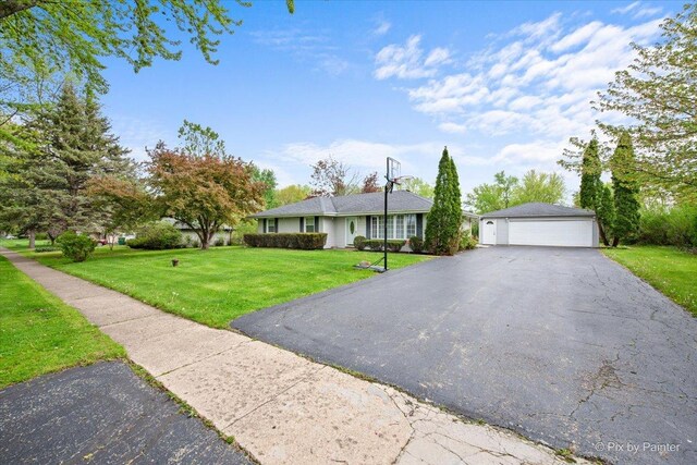 3700 Theodore St, Joliet, IL 60431 - ranch-style house featuring a front lawn and a garage