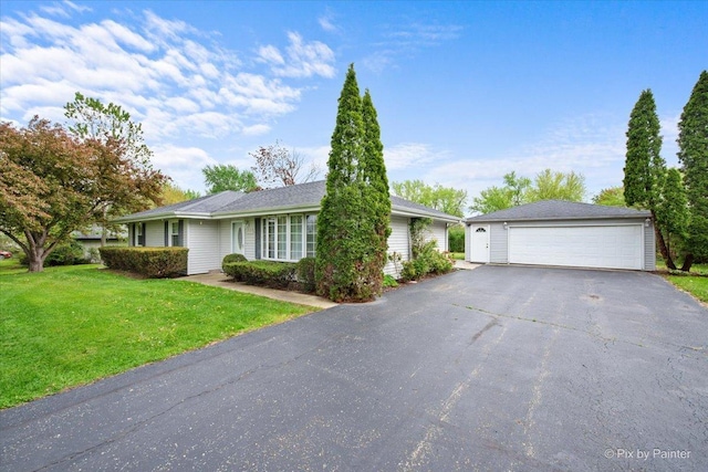 3700 Theodore St, Joliet, IL 60431 - single story home with a front yard, a garage, and an outdoor structure