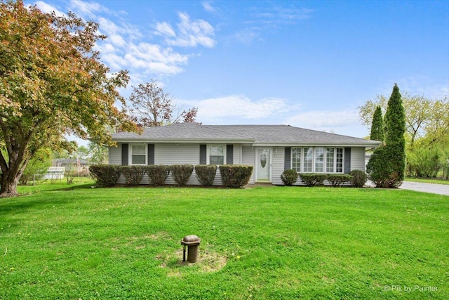 3700 Theodore St, Joliet, IL 60431 - ranch-style house featuring a front yard
