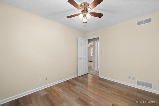 3700 Theodore St, Joliet, IL 60431 - empty room with wood finished floors, baseboards, and a ceiling fan