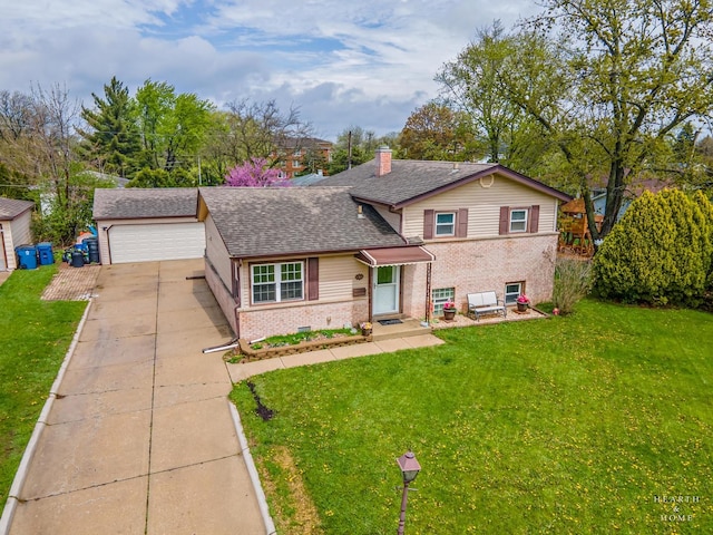 538 W Memory Ln, Addison, IL 60101 - tri-level home with brick siding, a front yard, and roof with shingles