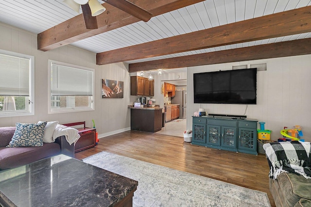 616 Kirk Ave, Elgin, IL 60120 - living area featuring wood finished floors, a ceiling fan, beam ceiling, wooden walls, and baseboards