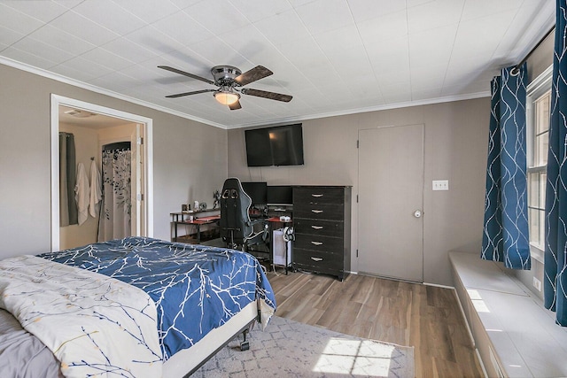 616 Kirk Ave, Elgin, IL 60120 - bedroom with wood finished floors, crown molding, an office area, and a ceiling fan