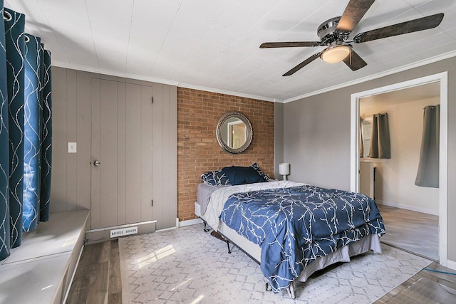 616 Kirk Ave, Elgin, IL 60120 - bedroom with wood finished floors, crown molding, baseboards, and ceiling fan