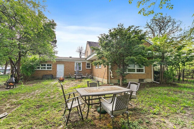 616 Kirk Ave, Elgin, IL 60120 - view of yard with fence and outdoor dining area