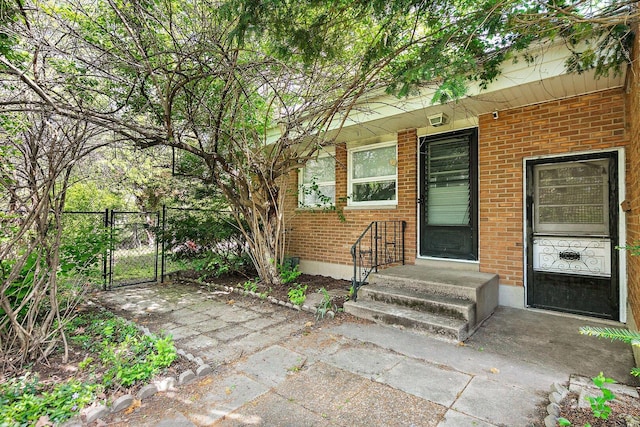 616 Kirk Ave, Elgin, IL 60120 - entrance to property featuring a gate and brick siding