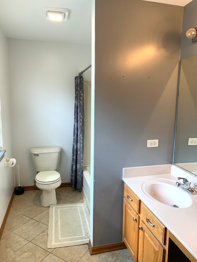 1453 Bluestem Ln, Minooka, IL 60447 - full bath with toilet, vanity, tile patterned floors, baseboards, and shower / tub combo