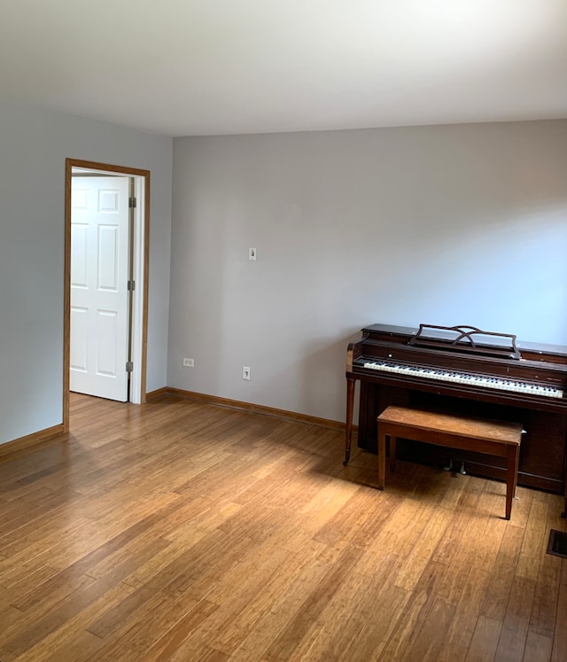 1453 Bluestem Ln, Minooka, IL 60447 - living area with wood finished floors and baseboards
