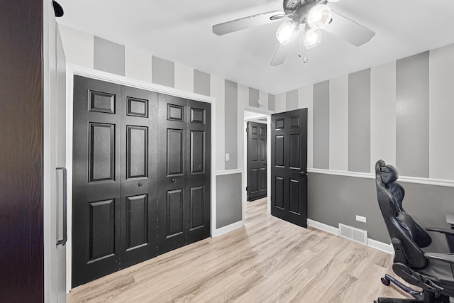 1156 N Fischer Dr, Addison, IL 60101 - home office with a ceiling fan, wood finished floors, and baseboards