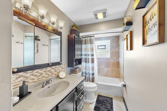 1156 N Fischer Dr, Addison, IL 60101 - bathroom featuring toilet, vanity, shower / tub combo, decorative backsplash, and tile patterned flooring