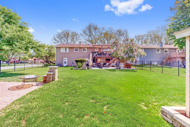 1156 N Fischer Dr, Addison, IL 60101 - back of property with stairs, a patio, a wooden deck, and a chimney