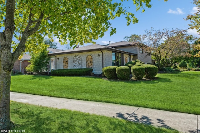 17000 Cherry Creek Ave, Tinley Park, IL 60487 - view of front of house with a front yard and brick siding