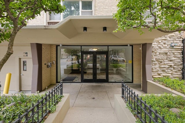 420 W Aldine Ave Unit 405, Chicago, IL 60657 - view of exterior entry with brick siding and french doors