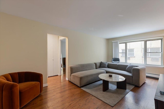 420 W Aldine Ave Unit 405, Chicago, IL 60657 - living area with baseboard heating and wood finished floors