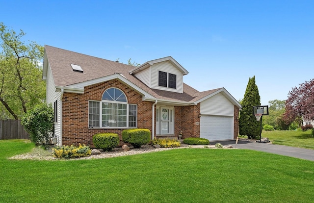 5157 Ribbon Ct, Monee, IL 60449 - view of front of house with brick siding, asphalt driveway, a garage, and roof with shingles
