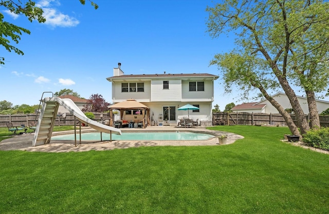 5157 Ribbon Ct, Monee, IL 60449 - back of property featuring a gazebo, a chimney, and a patio area