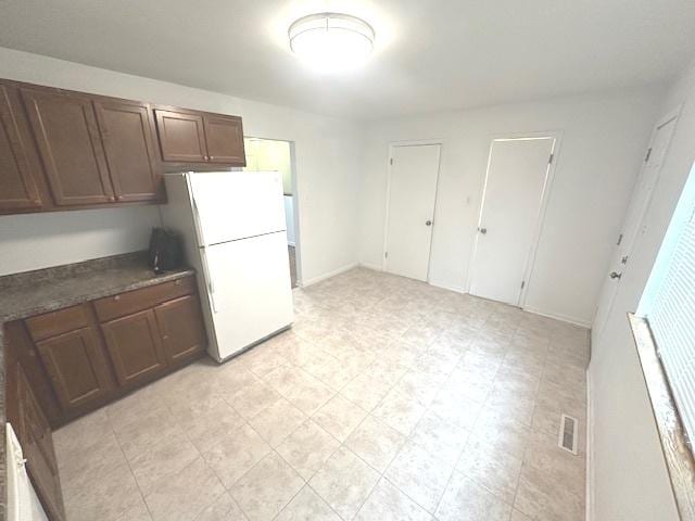 2209 171st St, Hazel Crest, IL 60429 - kitchen featuring freestanding refrigerator and dark countertops