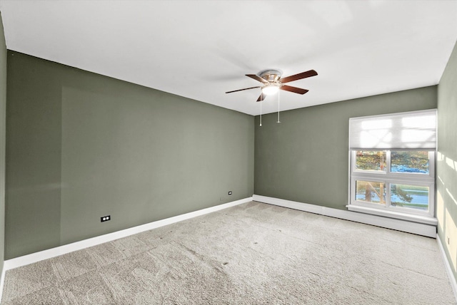 1926 Prairie Sq Unit 234, Schaumburg, IL 60173 - unfurnished room with a ceiling fan, baseboards, carpet flooring, and a baseboard heating unit