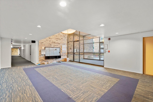 1926 Prairie Sq Unit 234, Schaumburg, IL 60173 - community lobby featuring brick wall and recessed lighting
