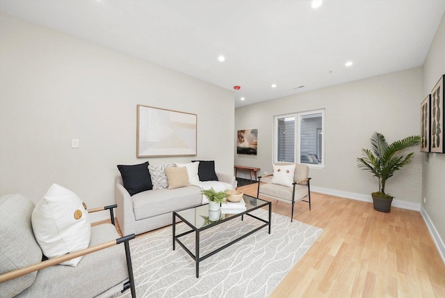 7453 Washington St, Forest Park, IL 60130 - living area featuring light wood-type flooring, baseboards, and recessed lighting
