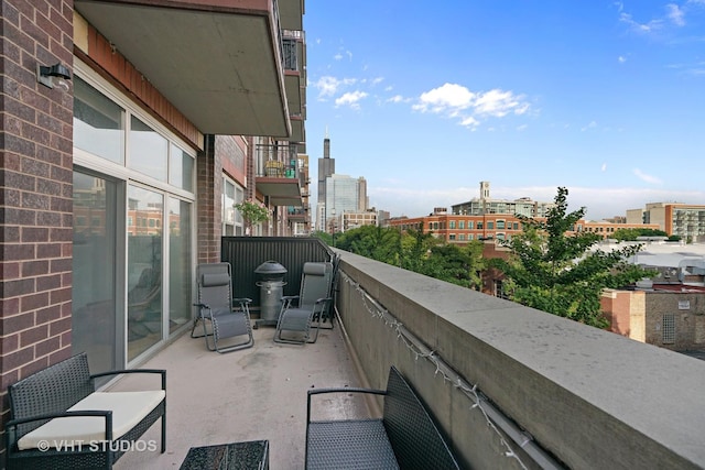 balcony featuring a view of city
